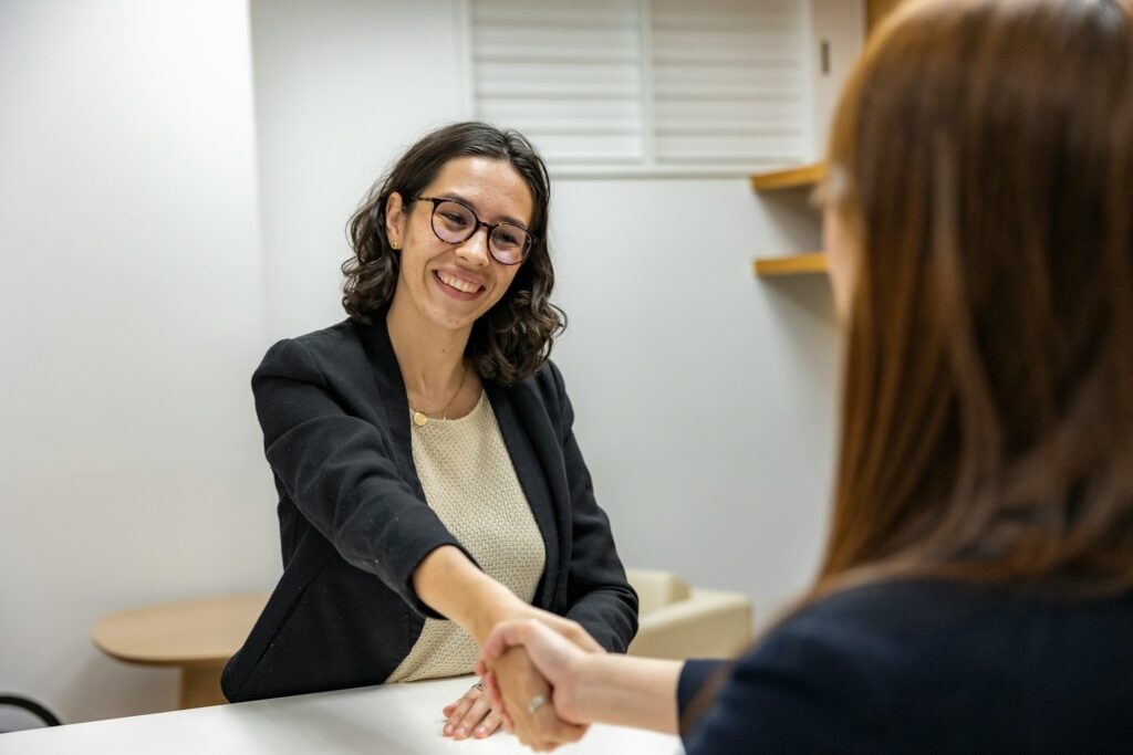 Personal Boundaries and Professionalism. Two femles shaking hands